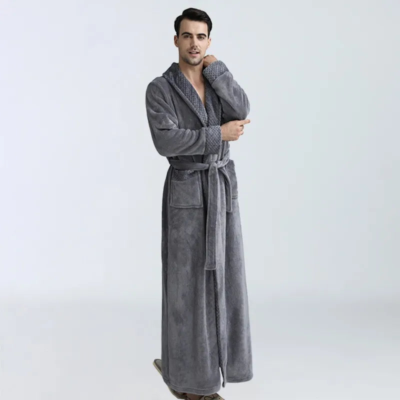 Man wearing a gray robe against a white background