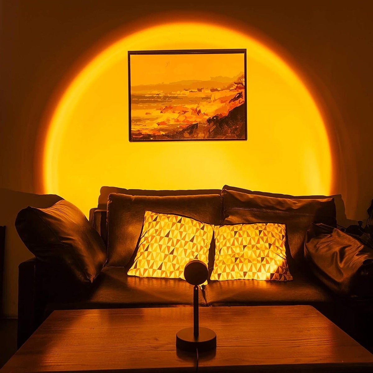 Cozy living room with a warm glow, sofa, and decorative pillows.