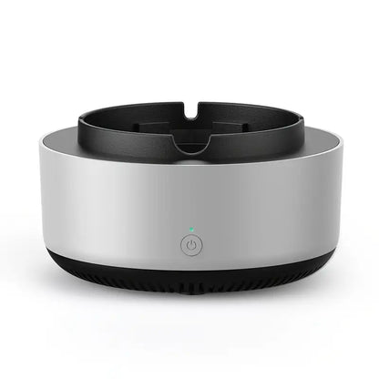 Round electronic device with black top and base on a white background