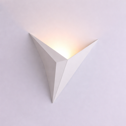 Triangular wall light fixture on a white background