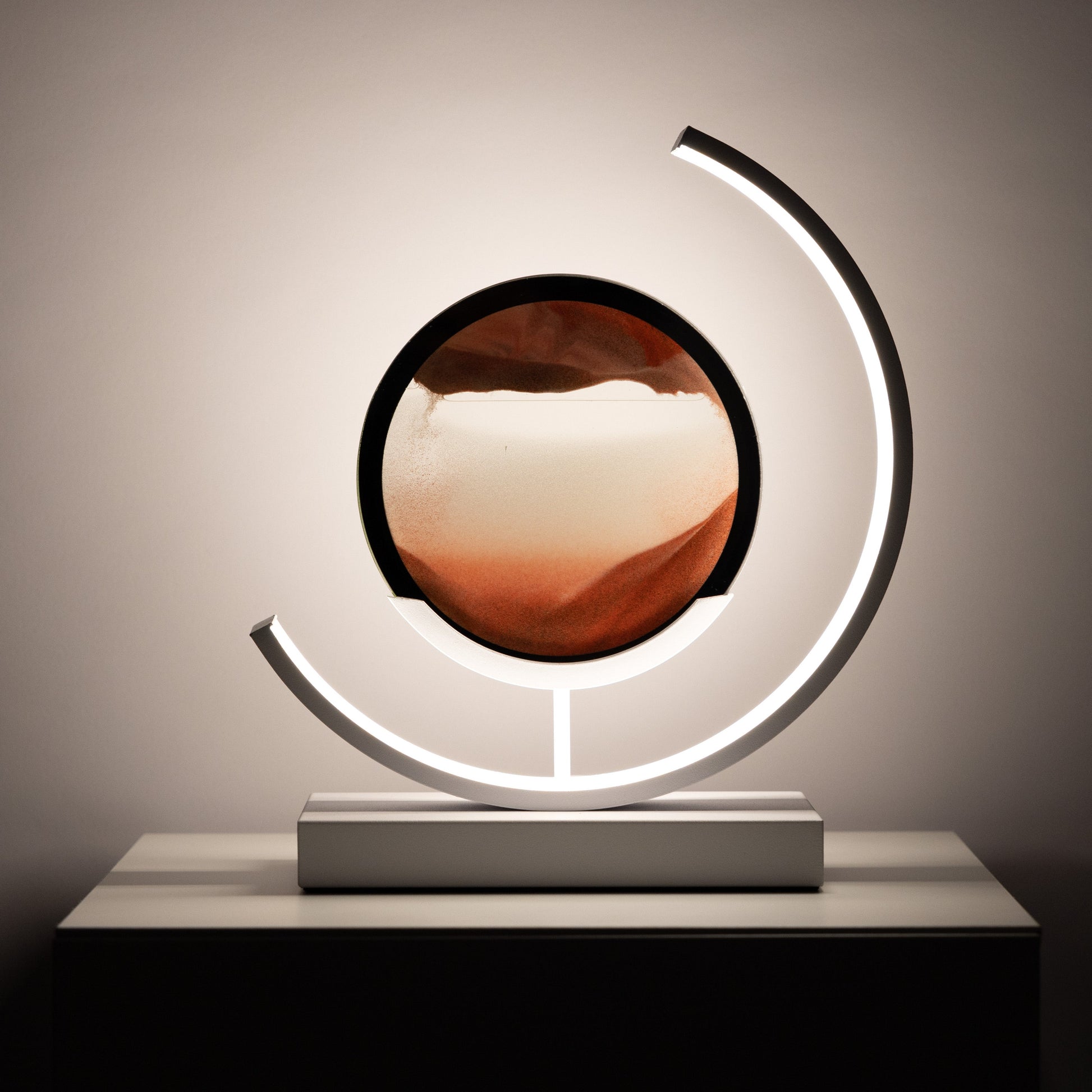 Modern decorative lamp with a circular design on a neutral background