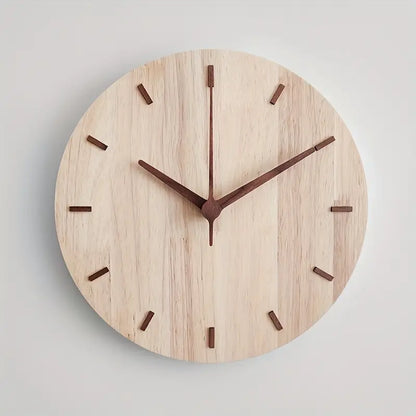 Wooden wall clock with brown hands on a light gray background