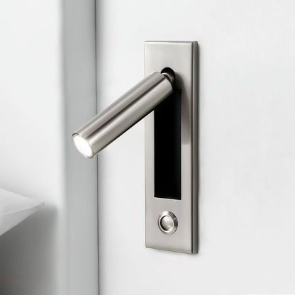 Metal door handle on a white door