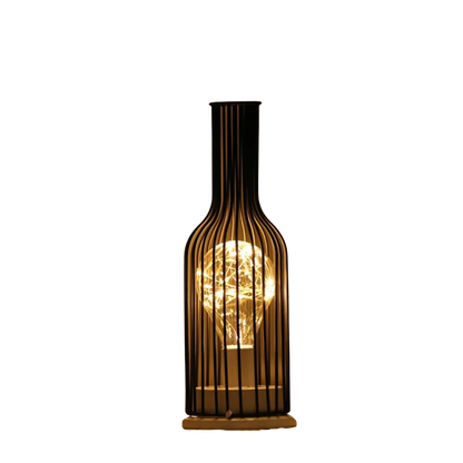 Decorative lamp made from a repurposed wine bottle on a white background