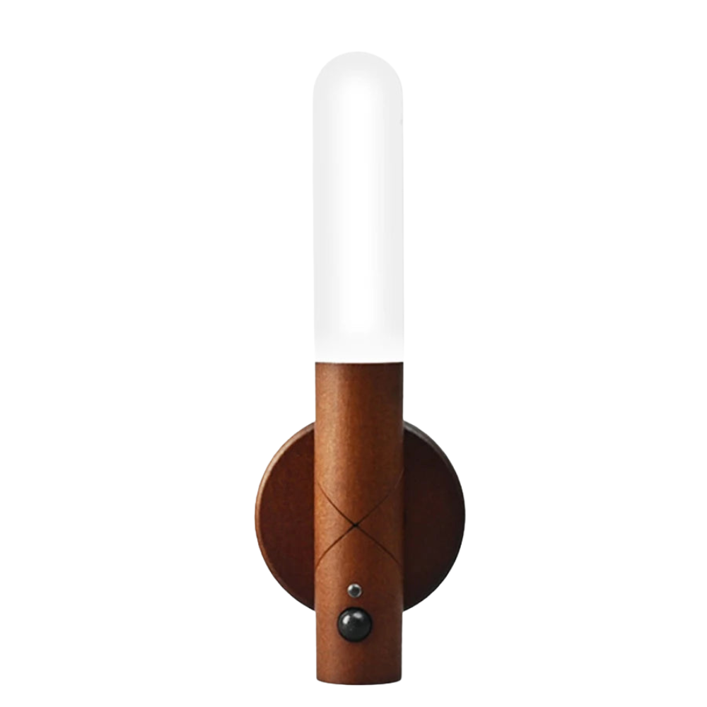 Wooden wall sconce with a white candle on a white background