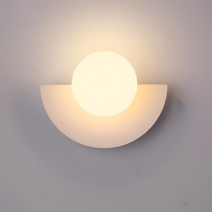 Semi-circular wall light fixture on a plain background