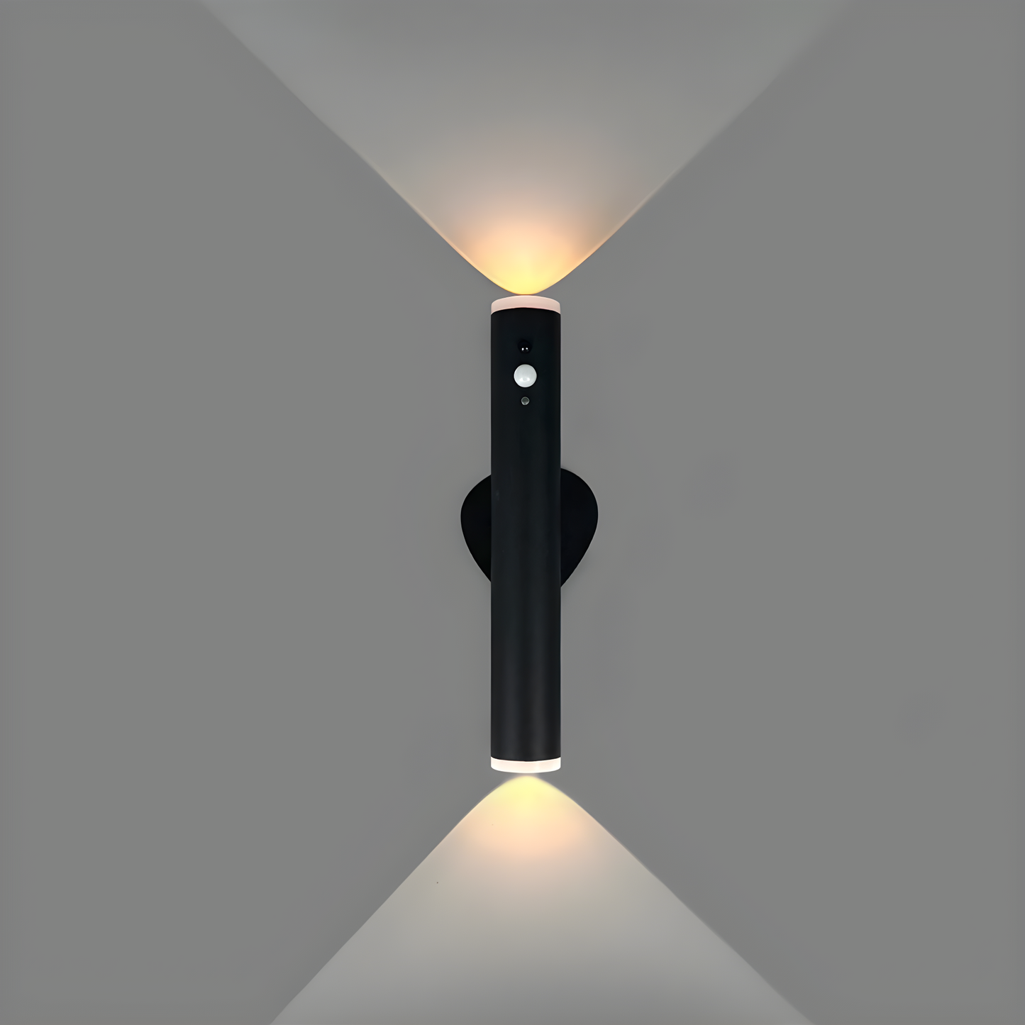 Black wall-mounted light fixture on a gray background