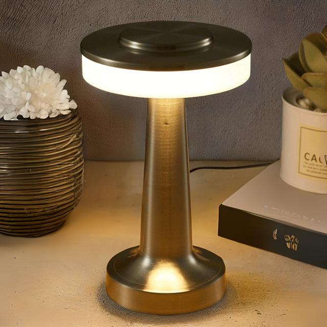 Table lamp on a surface with decorative items in the background