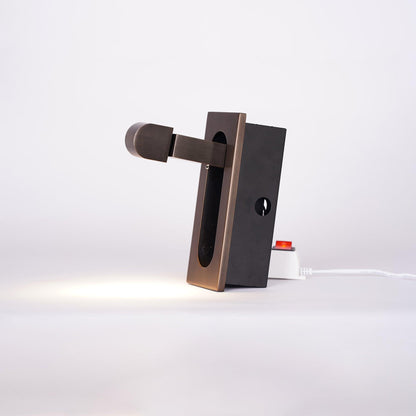 Modern wall-mounted light fixture on a white background