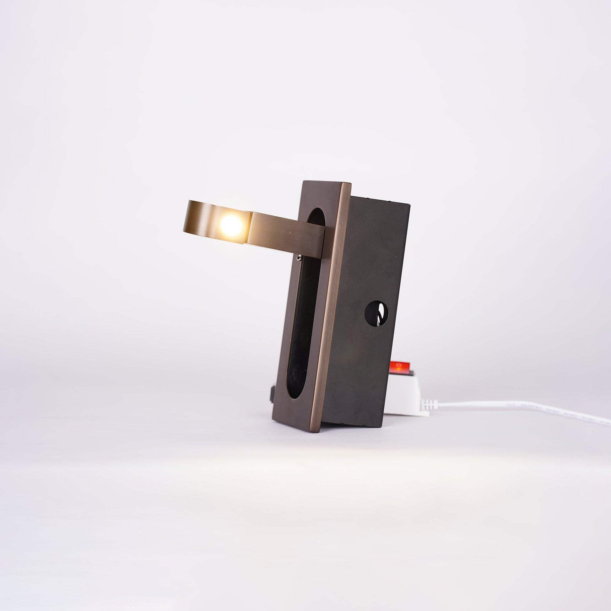 Modern wall-mounted light fixture on a white background