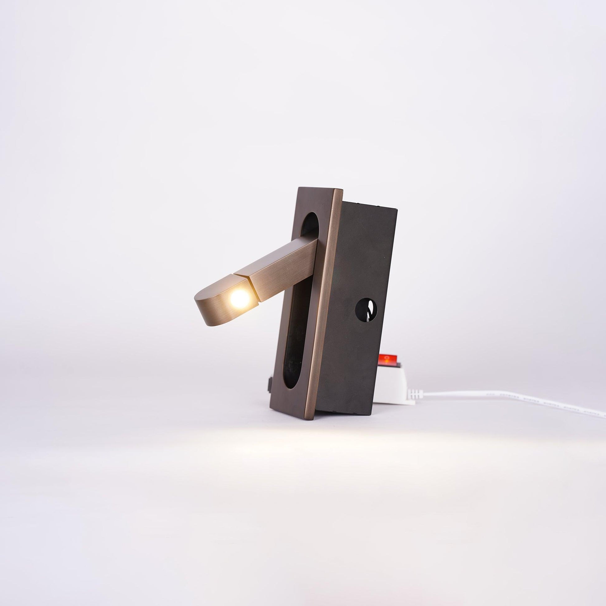 Modern wall-mounted light fixture on a white background