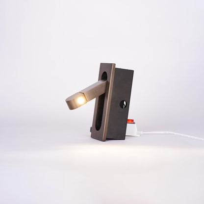 Modern wall-mounted light fixture on a white background