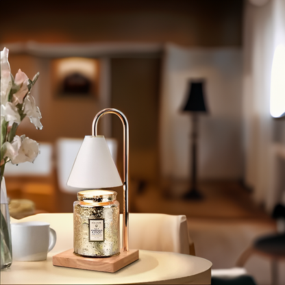Decorative lamp with a candle on a table in a softly blurred room setting