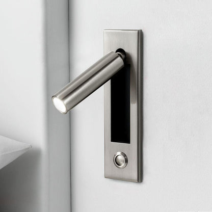 Metal door handle on a white door