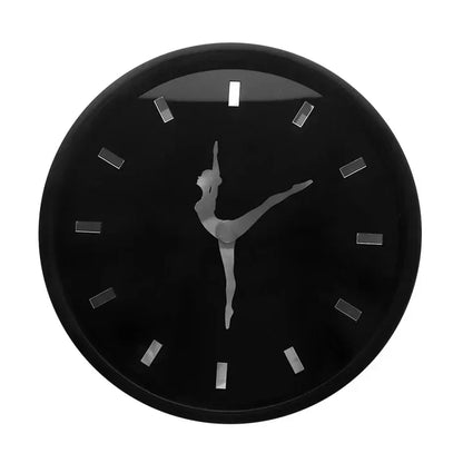 Black clock with a silhouette of a dancer on a white background
