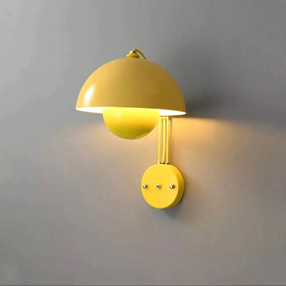 Yellow wall lamp on a gray wall