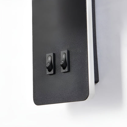 Black control panel with two switches on a white background
