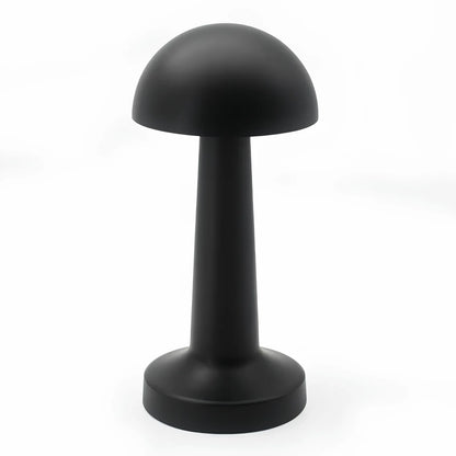Black mushroom-shaped object on a white background