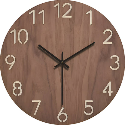 Wooden wall clock with black hands and white numbers on a white background