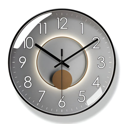 Round wall clock with black hands and white numbers on a gray background