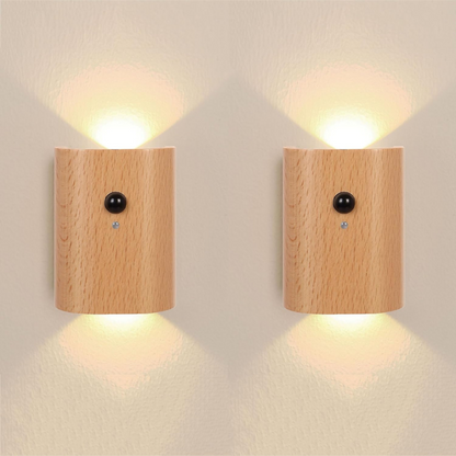 Two wooden wall lights on a plain wall