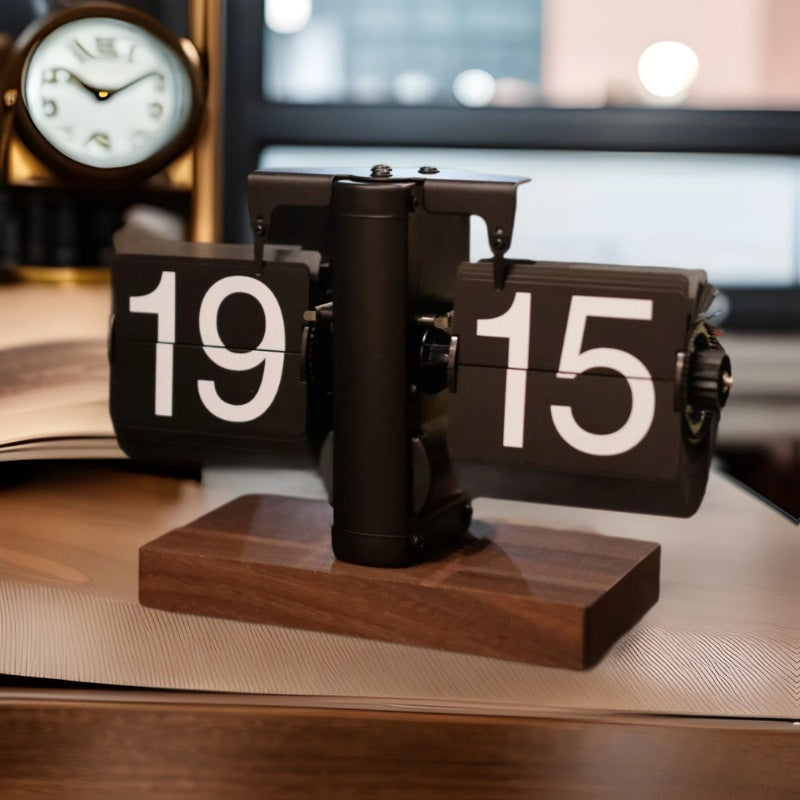 Tabletop clock with flip-up numbers on a wooden base