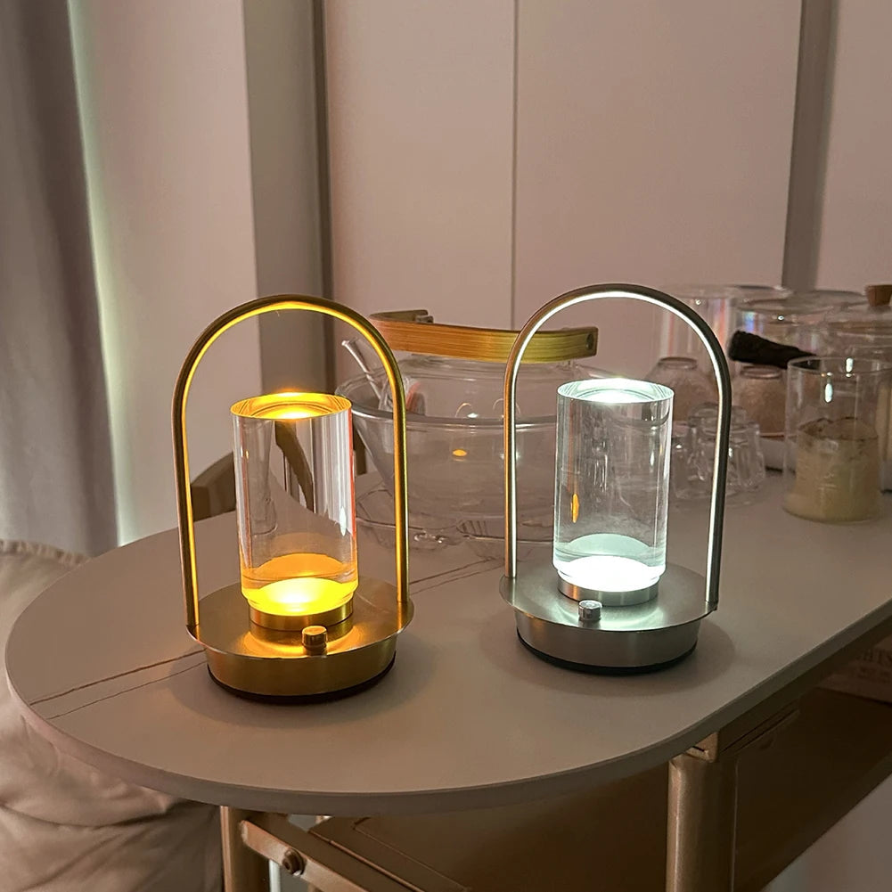 Two modern lamps on a table with a neutral background
