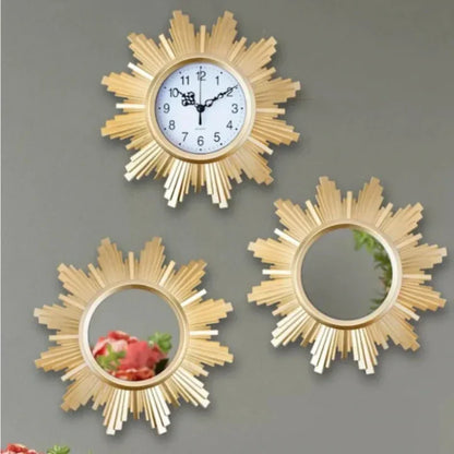 Three decorative wall clocks with sunburst designs on a gray background