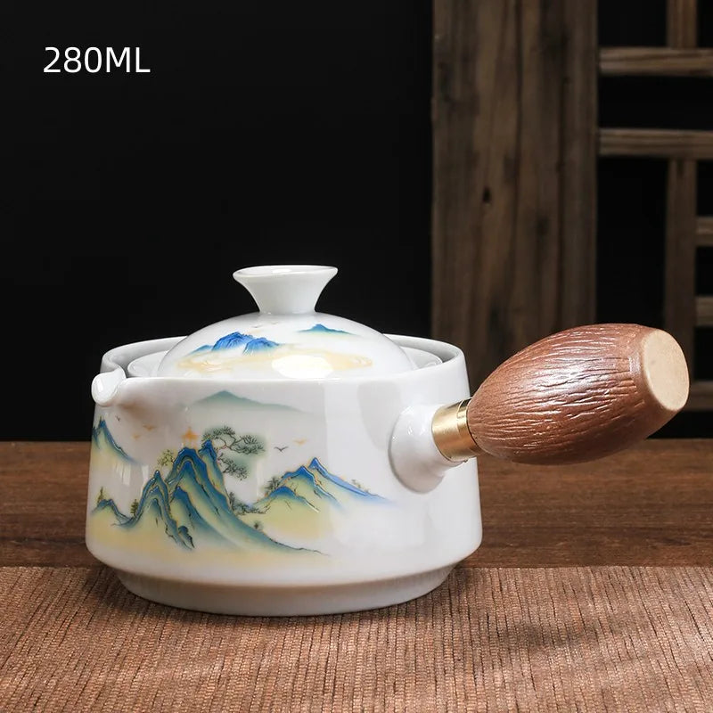 Classic Elegant Spinning Tea Pot
