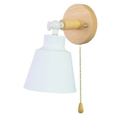 Wall-mounted light fixture with wooden arm and white shade on a white background