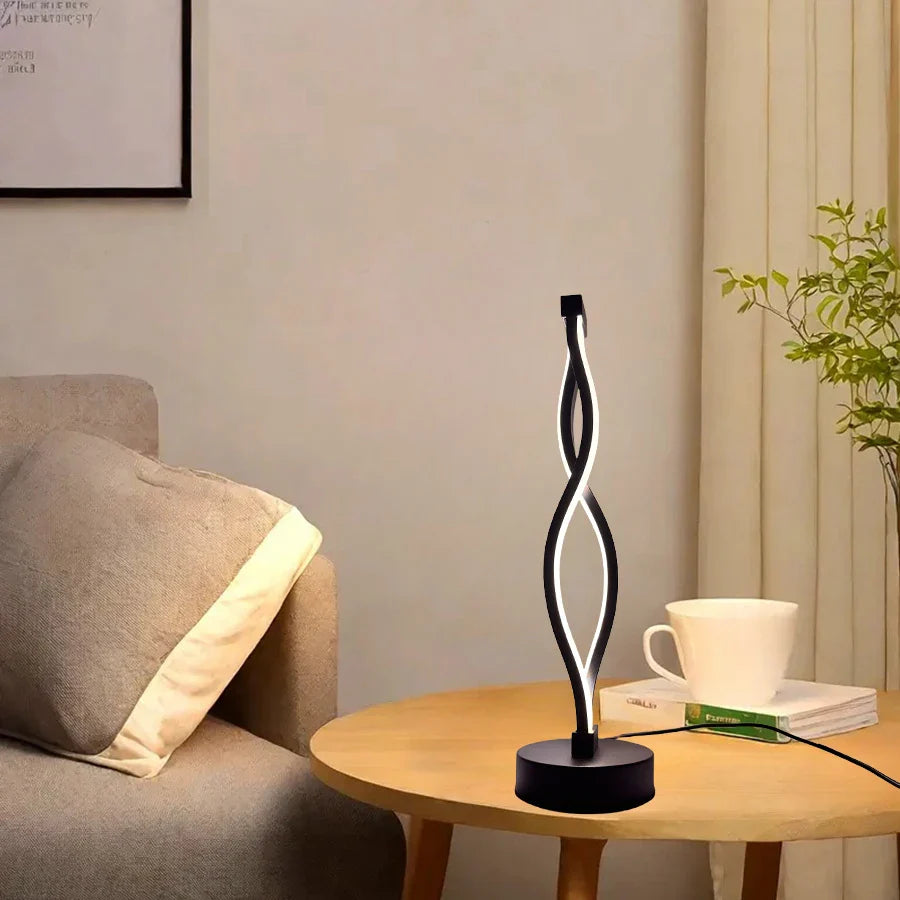 Modern table lamp on a wooden side table with a cozy living room setting.