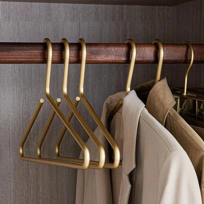 Set of 5 Stylish Metal Clothes Hangers in Matte Gold and Silver for Elegant Wardrobe Organization 1