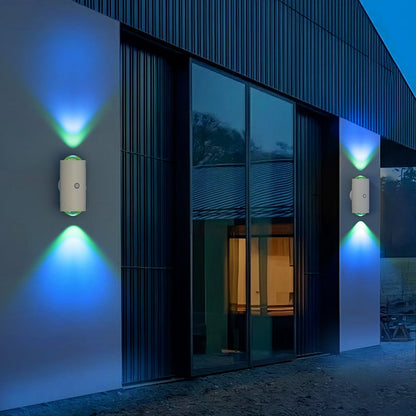Modern building exterior with wall-mounted lights emitting blue light