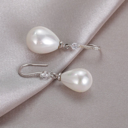 Elegant White Oval Pearl Earrings-Nora Luxe