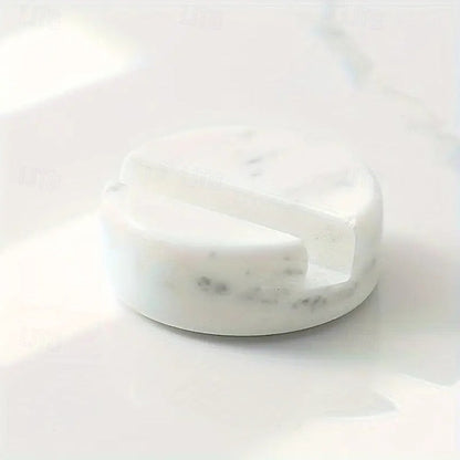 Round stone object on a white background