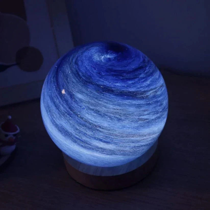 Blue glowing spherical light on a dark background
