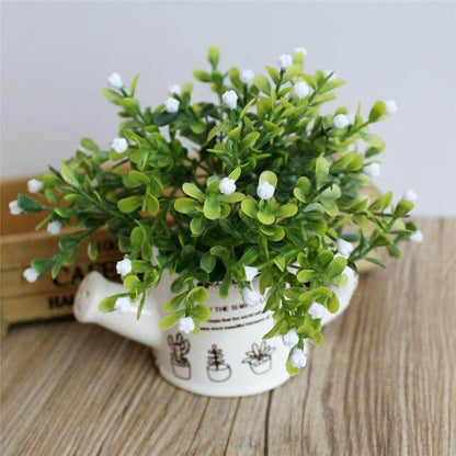 Silk Floral Arrangement in White Ceramic Vase