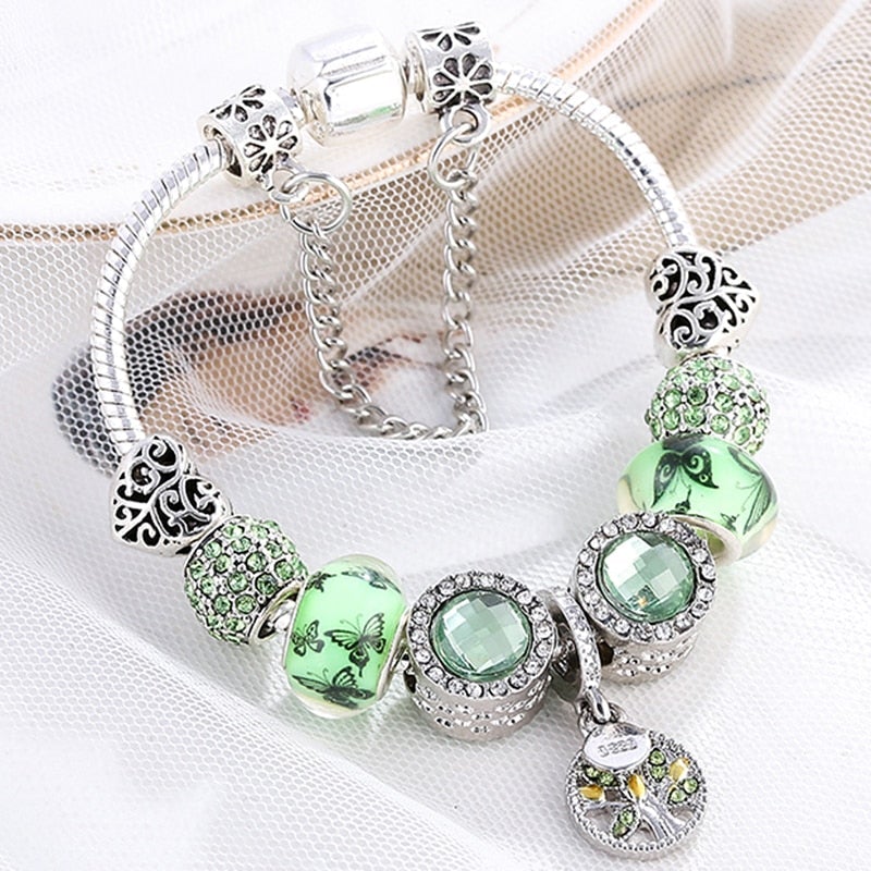 Sparkling Silver Bangle with Emerald Gemstones - Pexav